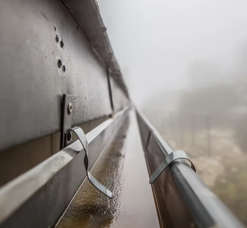 Close-up of gutter clearance work