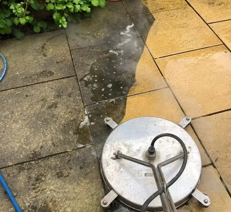 Jet washing patio with surface cleaner
