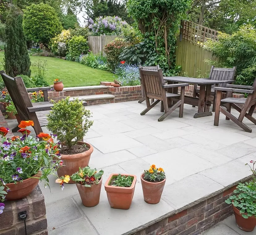 Beautiful clean garden patio with stone flags